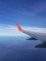 Wing aircraft in the blue sky