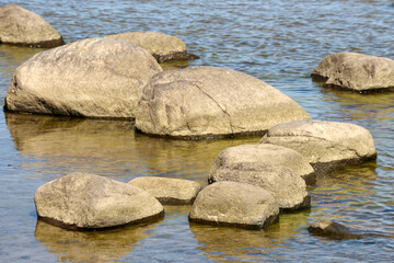 Fototapeta na wymiar Large stones at Baltic sea shore