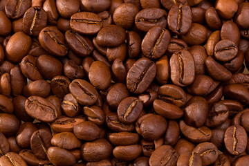 roasted coffee beans background. Top view. Close Up.