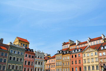 Fototapeta premium Warsaw (Warszawa) old town (Stare Miasto) architecture, vintage buildings, rebuild after world war II in Poland. Beautiful sunny day in the city.