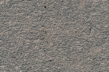 texture of dirty old asphalt with stones