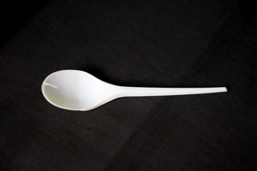 White plastic spoon