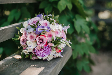 wedding bouquet of roses and pink chrysanthemums