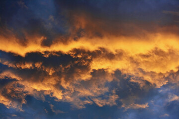 Naklejka na ściany i meble dramatic clouds in the sky