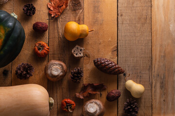 Autumn decoration banner with harvest on wooden background. Concept of thanksgiving day. Flat lay. Top view.