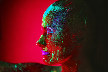 Girl colored fluorescent powder.
