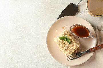 Concept of tasty lunch with plate of Napoleon cake