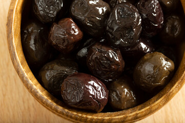 a plate of black olives