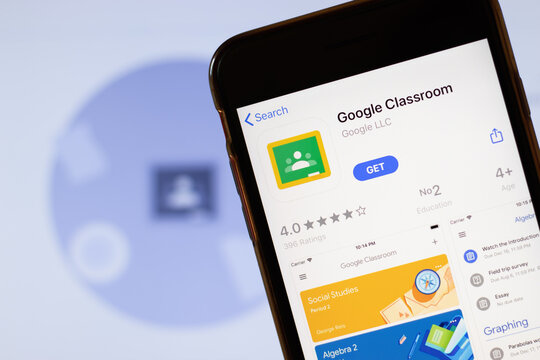 Los Angeles, California, USA - 24 March 2020: Google Classroom app logo on phone screen close up with website on background with icon, Illustrative Editorial
