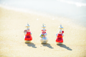 New Year travel. Funny summer snowman. Christmas banner, poster or greeting cards.