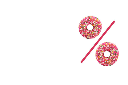 Symbol percent daily bakery discount on pastries. Percent sign is made of donuts in strawberry glaze with multi-colored backlighting. Creative bakery advertisement, space for text and logo