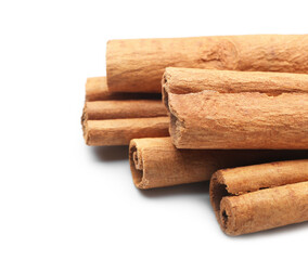 Cinnamon sticks on white background, closeup