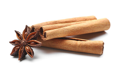 Cinnamon sticks and anise on white background