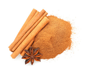 Cinnamon sticks, powder and anise on white background