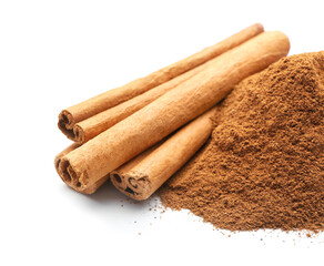 Cinnamon sticks and powder on white background, closeup