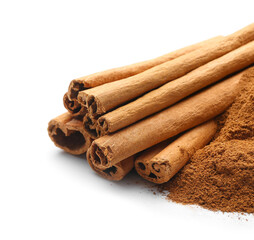 Cinnamon sticks and powder on white background, closeup