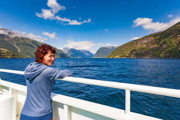 Fototapeta na wymiar Tourist woman on ferryboat, Norway