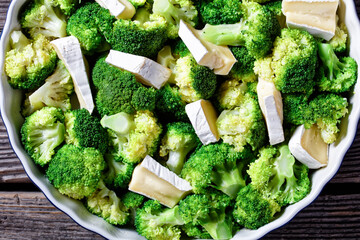 broccoli florets prepared to bake with brie cheese