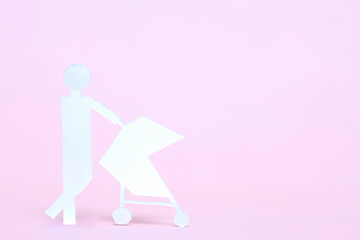 ペーパークラフトのベビーカーを押す人