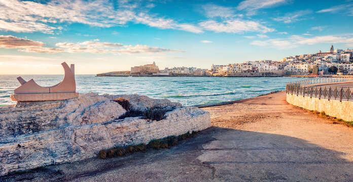 Panoramic morning cityscape of Vieste town. Colorful summer cescape of Adriatic sea, Gargano National Park, Apulia region, Italy, Europe. Traveling concept background.