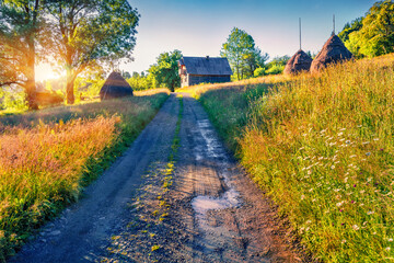 Amazing sunrise on romanian countryside, Rogojel village location. Bright summer scene of Cluj...