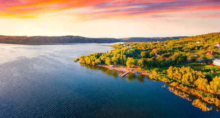 Panoramic morning view from flying drone of Bakotska Bay. Bright summer scene of Dnister river, Ukraine, Europe. Traveling concept background..