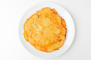 Pancakes with green beans on a white background