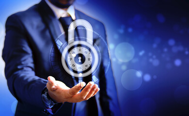 Fototapeta na wymiar Business man Holding Lock, Closed Padlock on digital background, Technology security concept. Modern safety digital background. Cyber Security and information or network protection