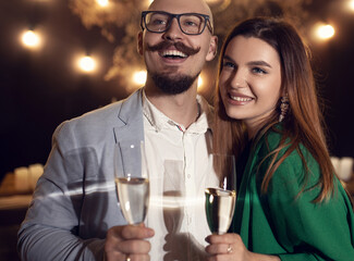 Romantic couple enjoying at the party cocktail together. Happy and smiling face