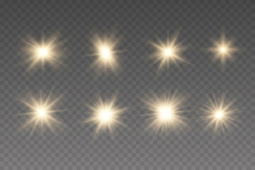 Set of golden glowing lights effects existing.  Christmas star. Yellow sparks sparkle with a special light.