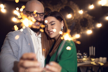 Romantic couple enjoying at the party cocktail together. Happy and smiling face