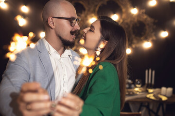 Romantic couple enjoying at the party cocktail together. Happy and smiling face