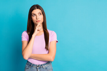 Photo of charming sweet woman girl dressed casual violet t-shirt arm finger chin look empty space...