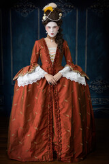 Fototapeta premium 18th-century woman wearing a silk robe a la Francaise 