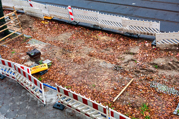 Naklejka premium view of sidewalk at road construction site