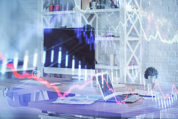 Forex market chart hologram and personal computer background. Double exposure. Concept of investment.