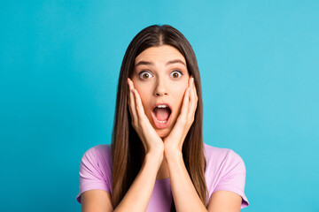 Photo of funny surprised woman girl wear casual violet outfit arms cheeks open mouth isolated blue color background