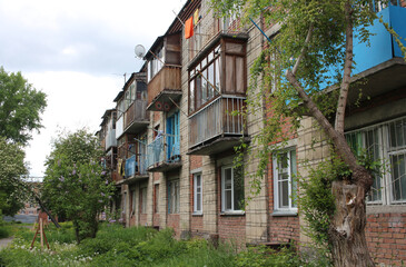facade of an apartment building with balconies architecture in the city of green lawn