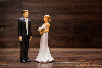Wedding topper against wood background