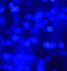 Blue light patterns over house.