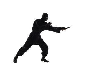 japanese ninja in black uniform on white background © tankist276