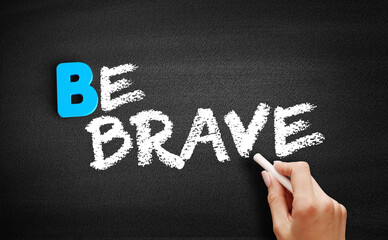 Be Brave text on blackboard, concept background