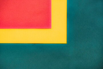 Fototapeta premium Abstract square background.Dark green, yellow and terracotta.