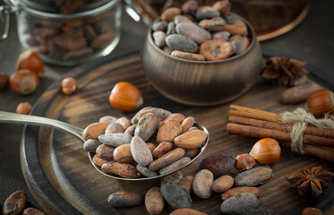 Cocoa beans on old background