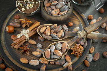 Cocoa beans on old background
