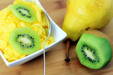 Delicious pear and kiwi fruit in a bowl.