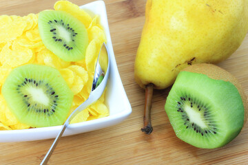 Delicious pear and kiwi fruit in a bowl.