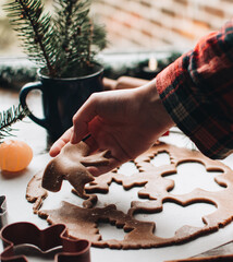 Christmas cookies. Making gingerbread cookies for Holidays. Gingerbread dough. Christmas Baking background. Form for cutting gingerbread. Merry Christmas and Happy Holidays. 