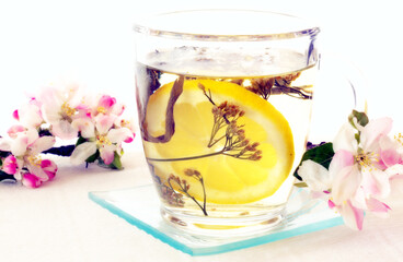 Healthy herbal drink in a bowl of glass.