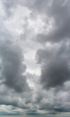 Fantastic soft thunderclouds, vertical panorama natural composition
